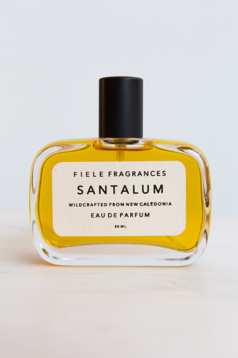 A bottle of Santalum Fiele Fragrances, extracted from plants and crafted from raw materials from around the world