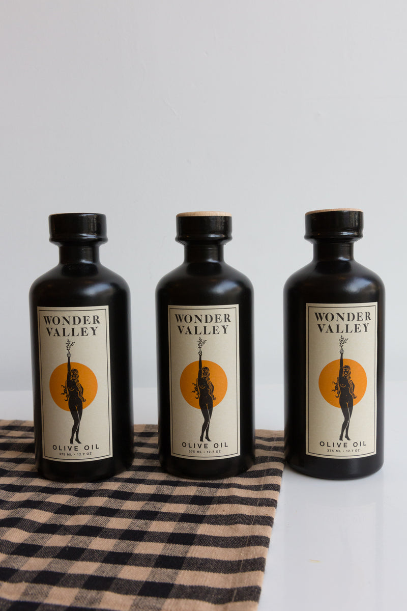 Bottles of Wonder Valley Olive Oil
