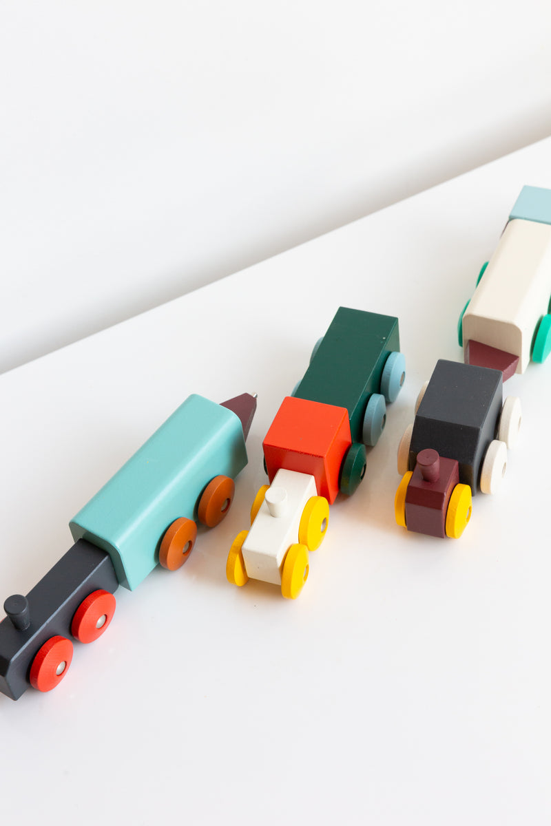 Areaware Hovers Tractors crafted from contemporary shapes and painted in bright colors