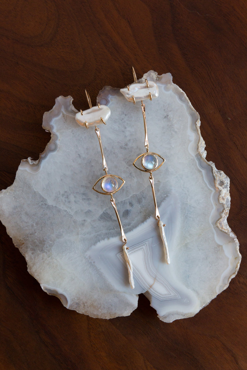 Handcrafted in New Mexico with 14k yellow gold, mar keshi pearls, and moonstone, these Halcyon Beholder heirloom earrings will last you for generations