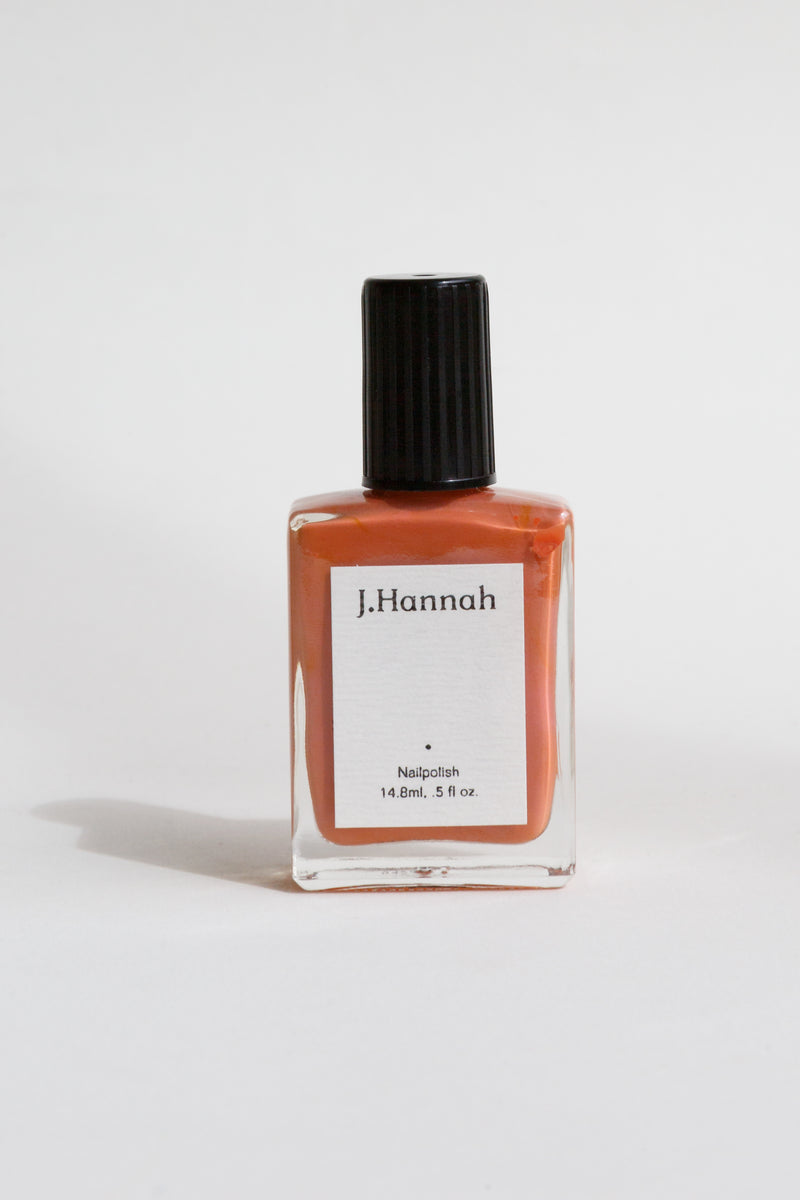 Bottle of orange J.Hannah nail polish