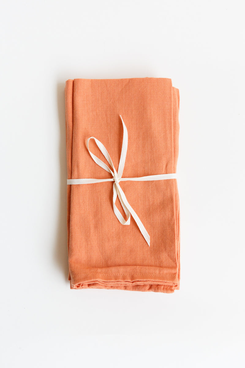 Orange Natural Habitat solid napkin set handmade with 100% organic cotton using traditional craft techniques