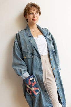 Person wearing a long sleeve Half Skein Belma jacket with color patches