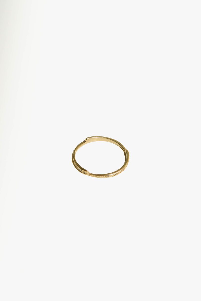 T.Kahres jewelry 10kt gold razor eternity band with diamonds