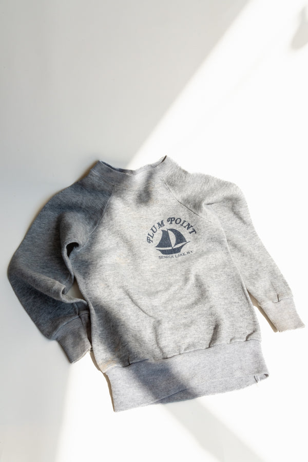 Plum Point Sweatshirt from Gus & Way, featuring a rich plum color and classic design. Perfect for adding comfort and vintage charm to children’s casual wear.