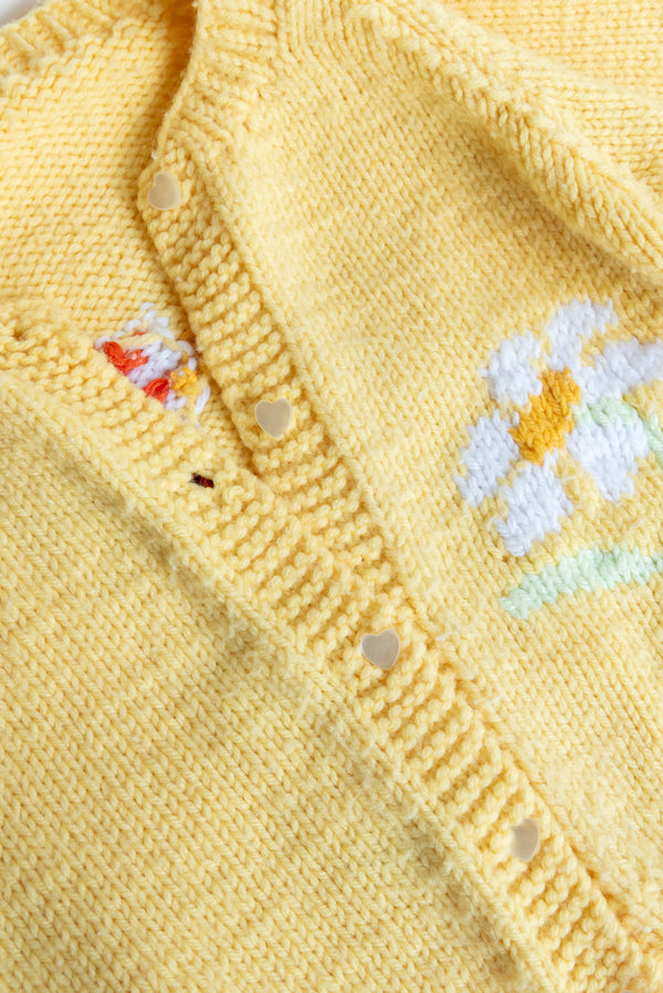 Handknit yellow sweater
Dandelion design sweater
Girl pattern sweater
Vintage handknit sweater
Gus & Way sweater
Retro dandelion knitwear
Handmade children’s sweater
Unique girl design cardigan
Yellow knit sweater
Artisan-made vintage sweater
Handcrafted yellow cardigan
Whimsical knitwear for kids
Gus & Way vintage clothing
Ethical handknit sweater
Playful dandelion sweater