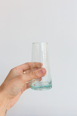 A person holding a glass from Verve Culture Moroccan Glassware