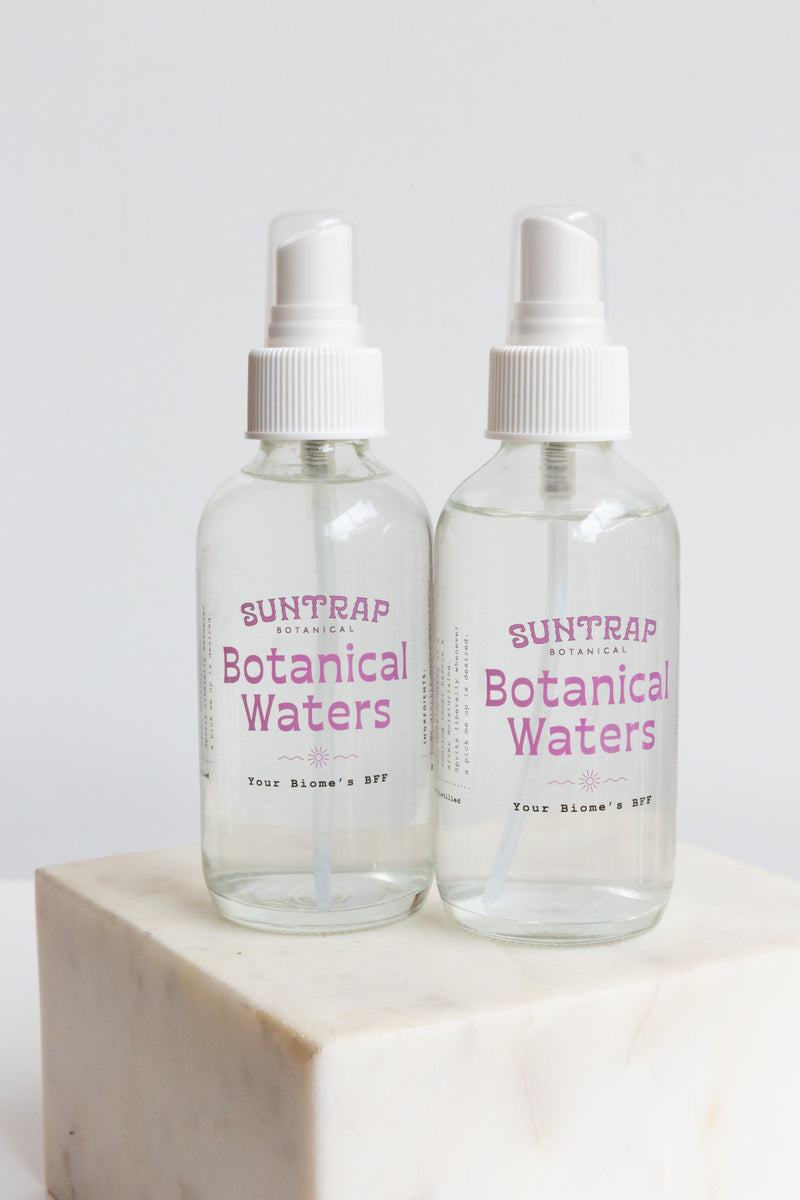 Bottles of Suntrap Botanical Botanical Water Spray