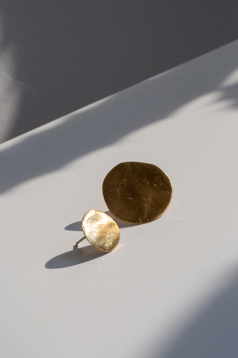 Beautifully textured brass stud earrings, handcrafted in NYC by 8.6.4.