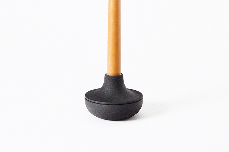 Person using an Areaware Candle Holder