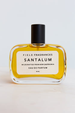 A bottle of Santalum Fiele Fragrances, extracted from plants and crafted from raw materials from around the world