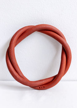 Red Sin Ceramic Twist Trivet