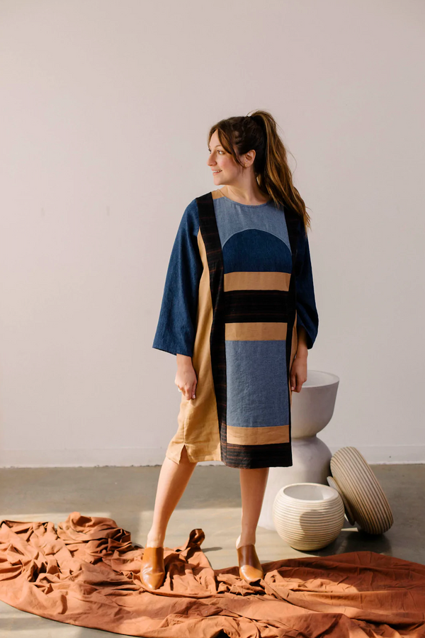 Handcrafted by Pamut Apparel and made from a mix of European linen, hemp/cotton, and handwoven cotton khadi, this Geometry Dress is inspired by a vintage quilt and is on display on a model