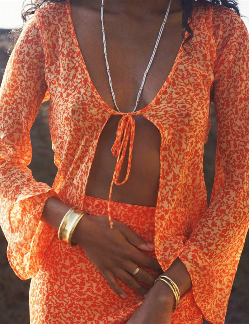 Person wearing a white Satomi Double Strand Necklace