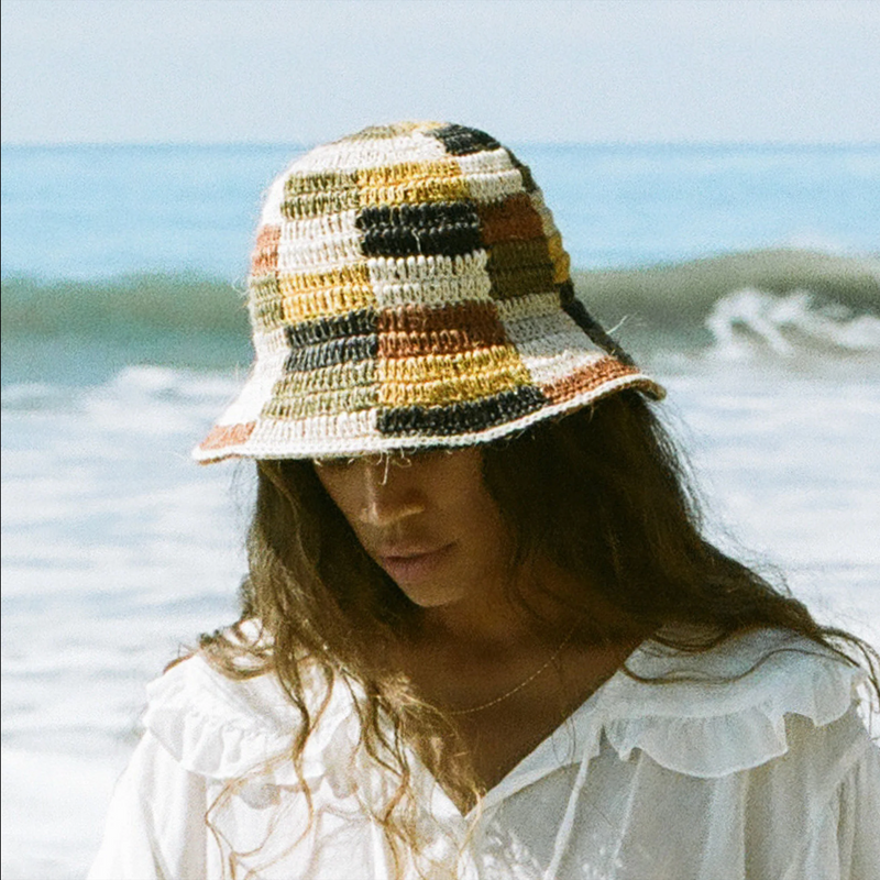 Person wearing a Made By Minga vegan Summer Bucket Hat