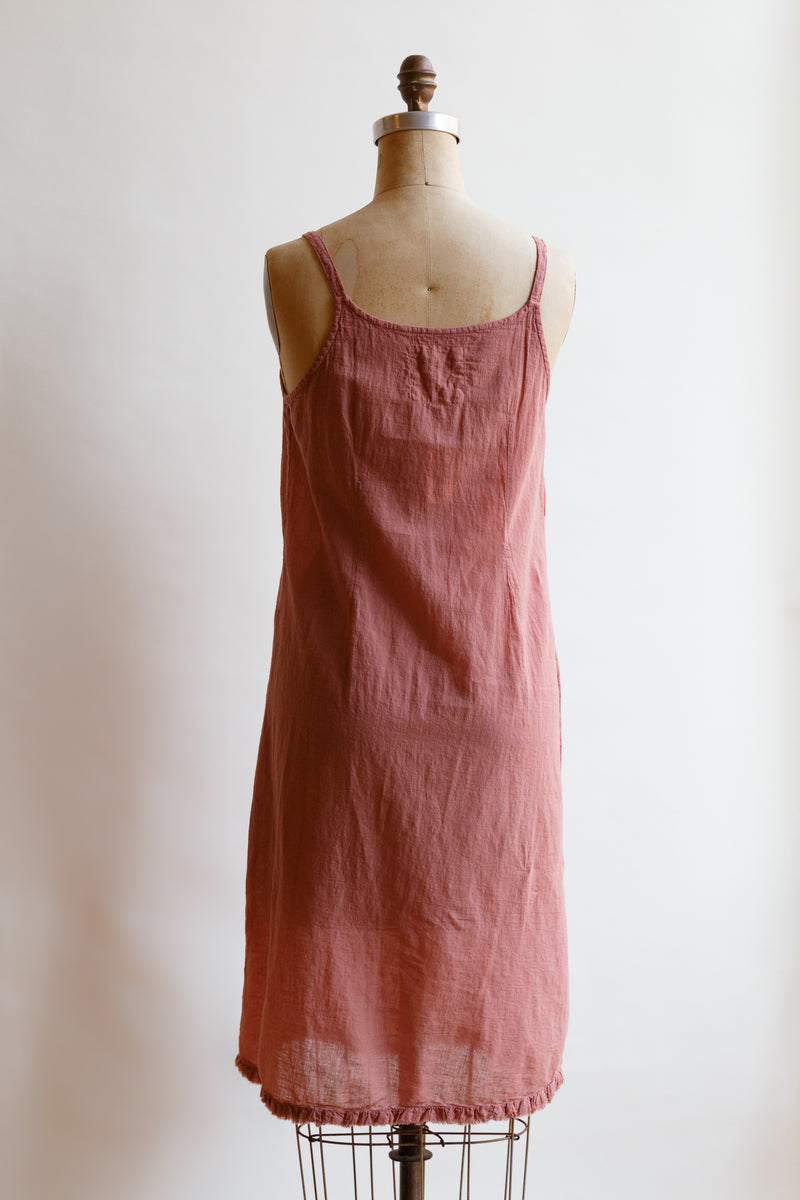 Handcrafted in India by weaver artisans using hand-spun yarn, this charming light weight rose slip by Auntie Oti is on display on a mannequin