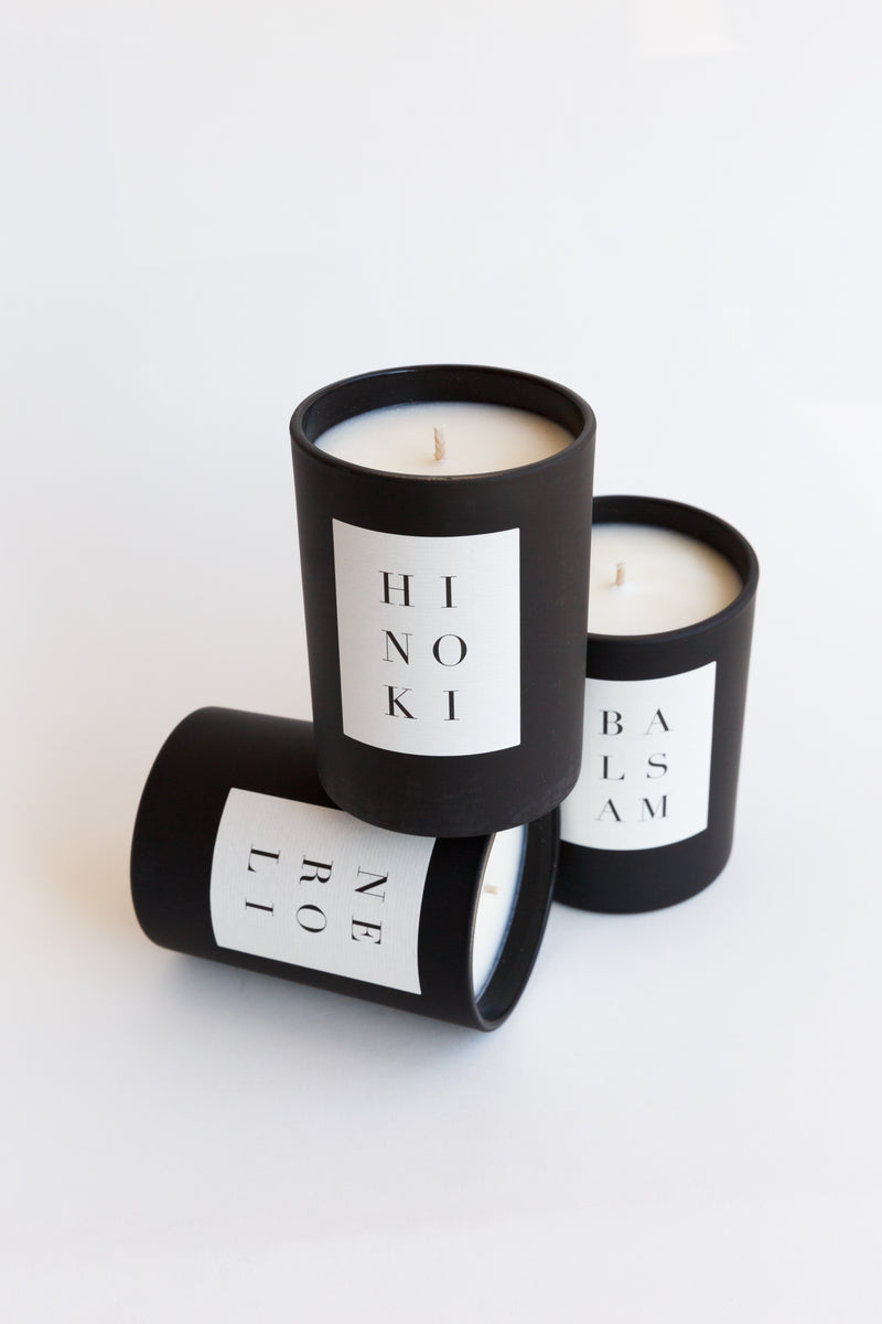Jars of candles from the Brooklyn Candle Studio Noir Collection