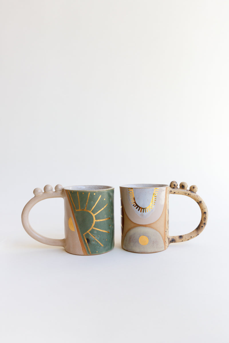 Curious clay Balance Ball Mugs with gold luster