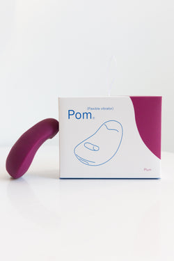 A purple Dame Pom Vibrator