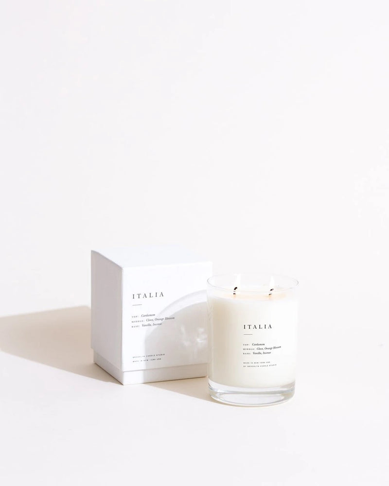 A jar of Italia scented candle from the Brooklyn Candle Studio Escapist Collection