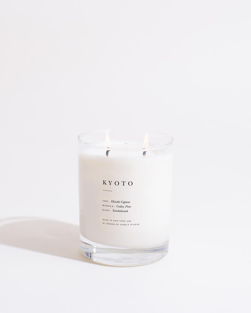 A jar of Kyoto scented candle from the Brooklyn Candle Studio Escapist Collection