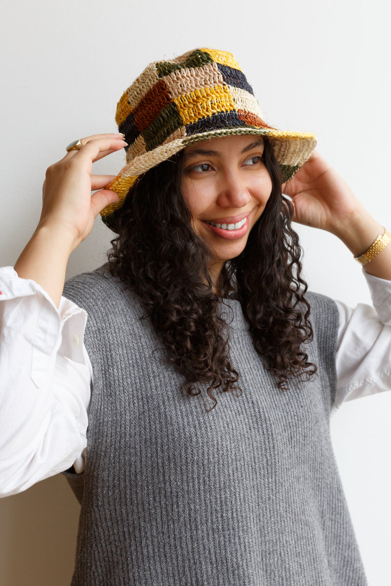 Person wearing a Made By Minga vegan Summer Bucket Hat