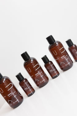 Bottles of Maude Shine Lubricant, a 100% natural, organic and ultra-hydrating lubricant
