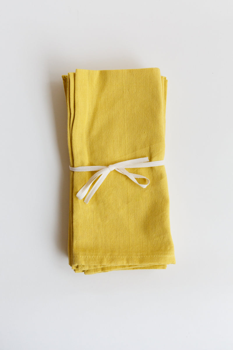 Yellow Natural Habitat solid napkin set handmade with 100% organic cotton using traditional craft techniques
