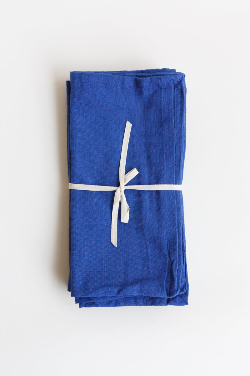 Royal blue Natural Habitat solid napkin set handmade with 100% organic cotton using traditional craft techniques