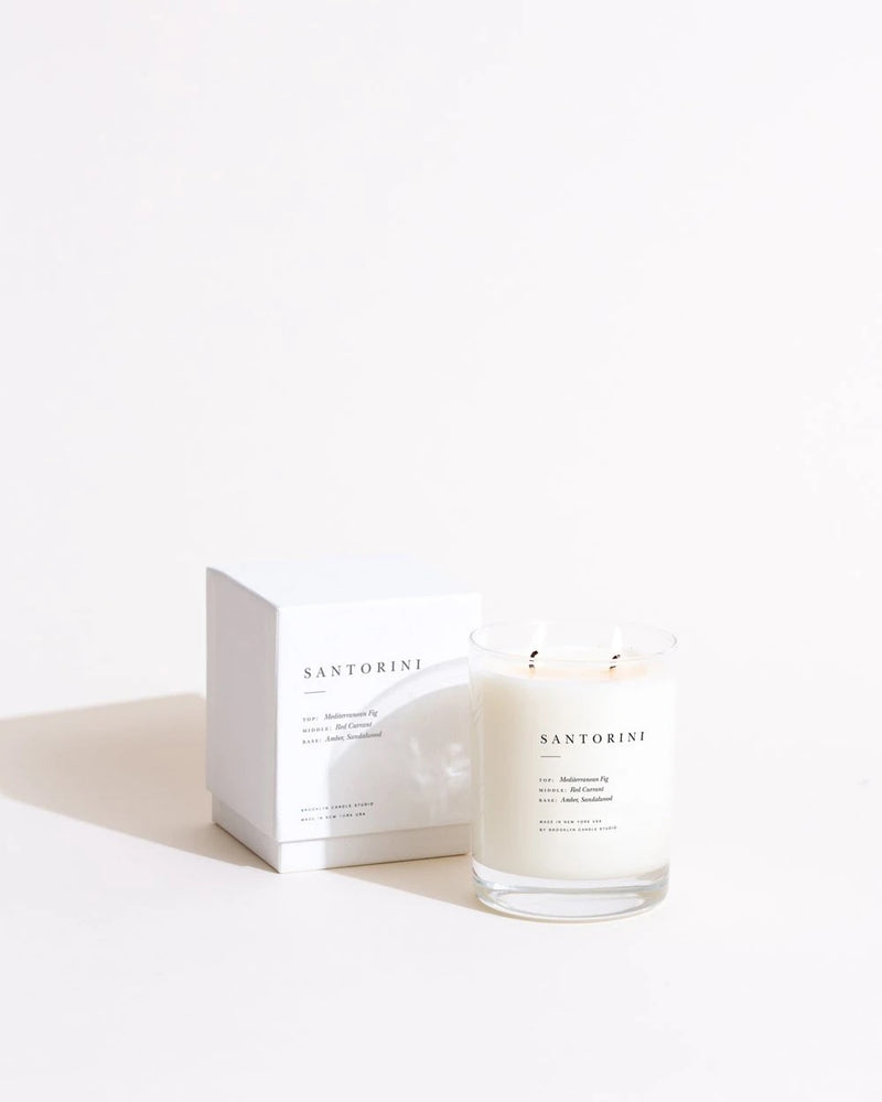A jar of Santorini scented candle from the Brooklyn Candle Studio Escapist Collection