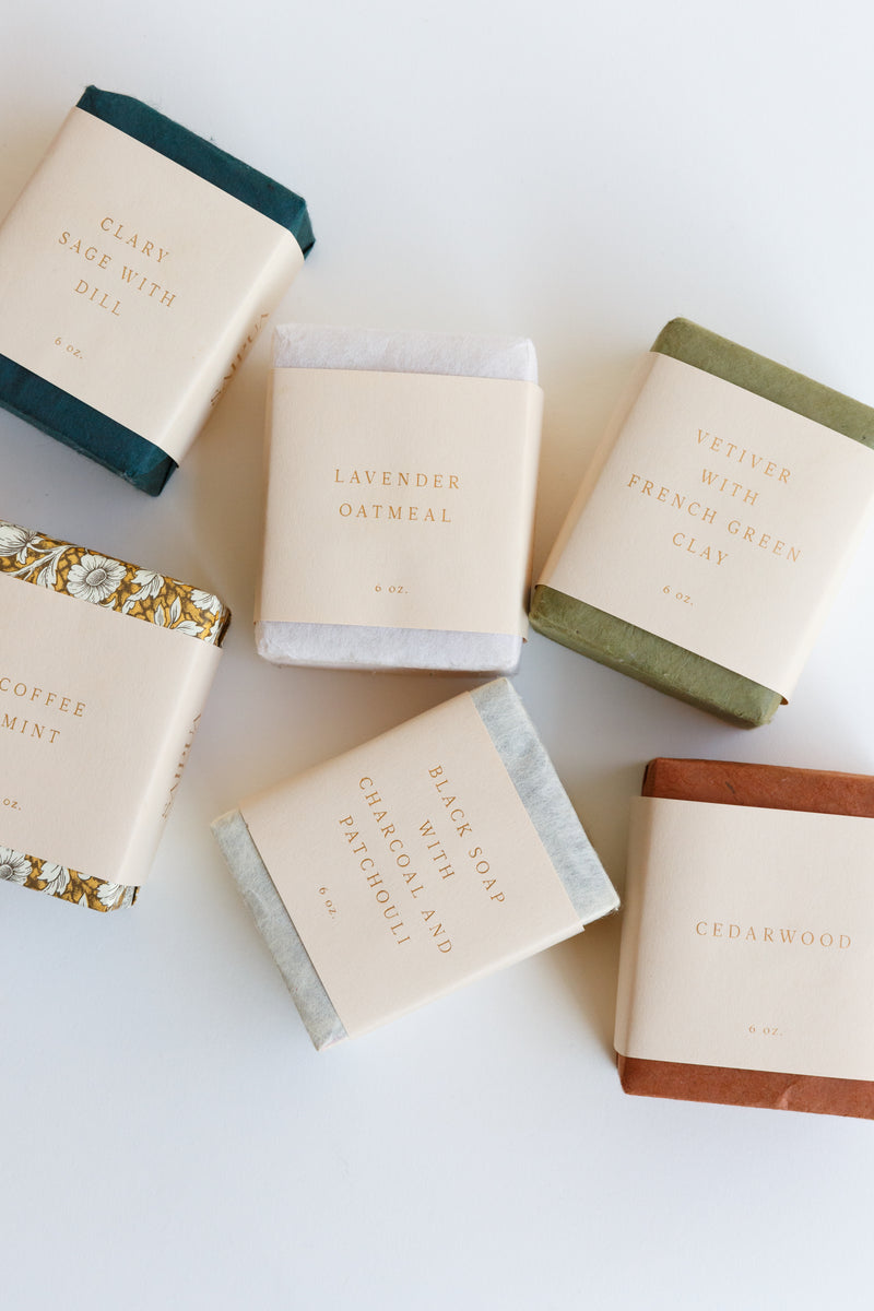 An arrangement of beautiful handcrafted Saipua Soaps made in New York and wrapped in beautiful handmade paper