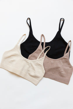 A collection of different colored cotton silk sporty bralettes with bottom ribbing
