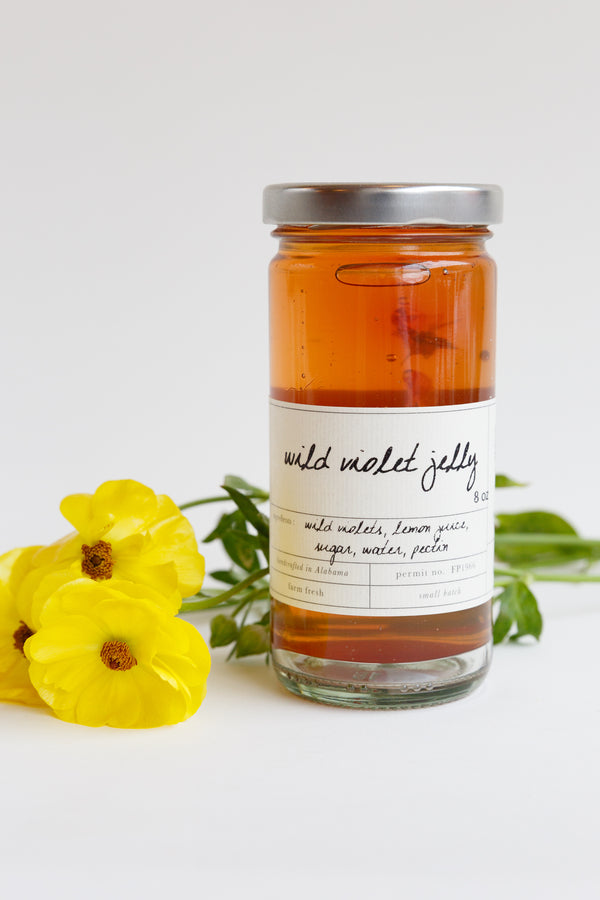 A jar of Stone Hollow Farmstead Wild Violet Jelly