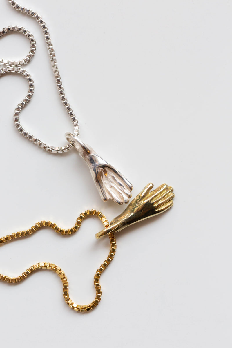 Moon+Arrow's receive necklace in brass and sterling silver