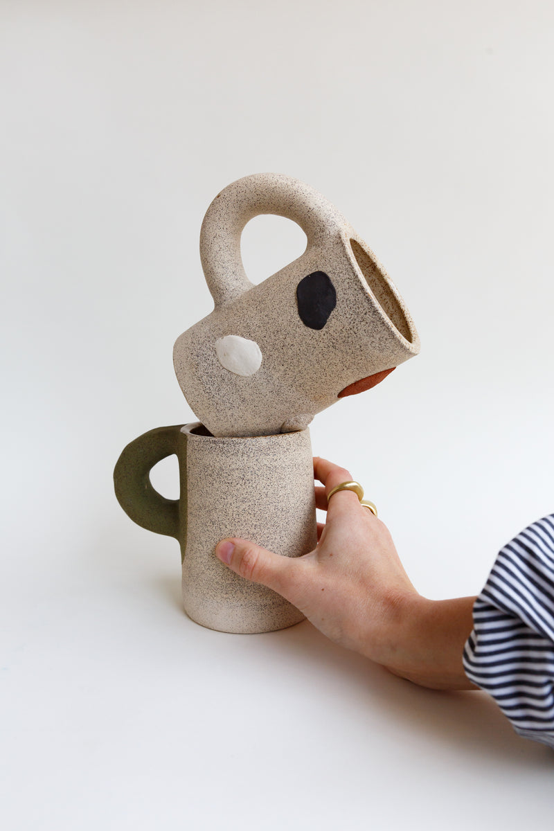 A person holding Utility Objects Rock Mugs